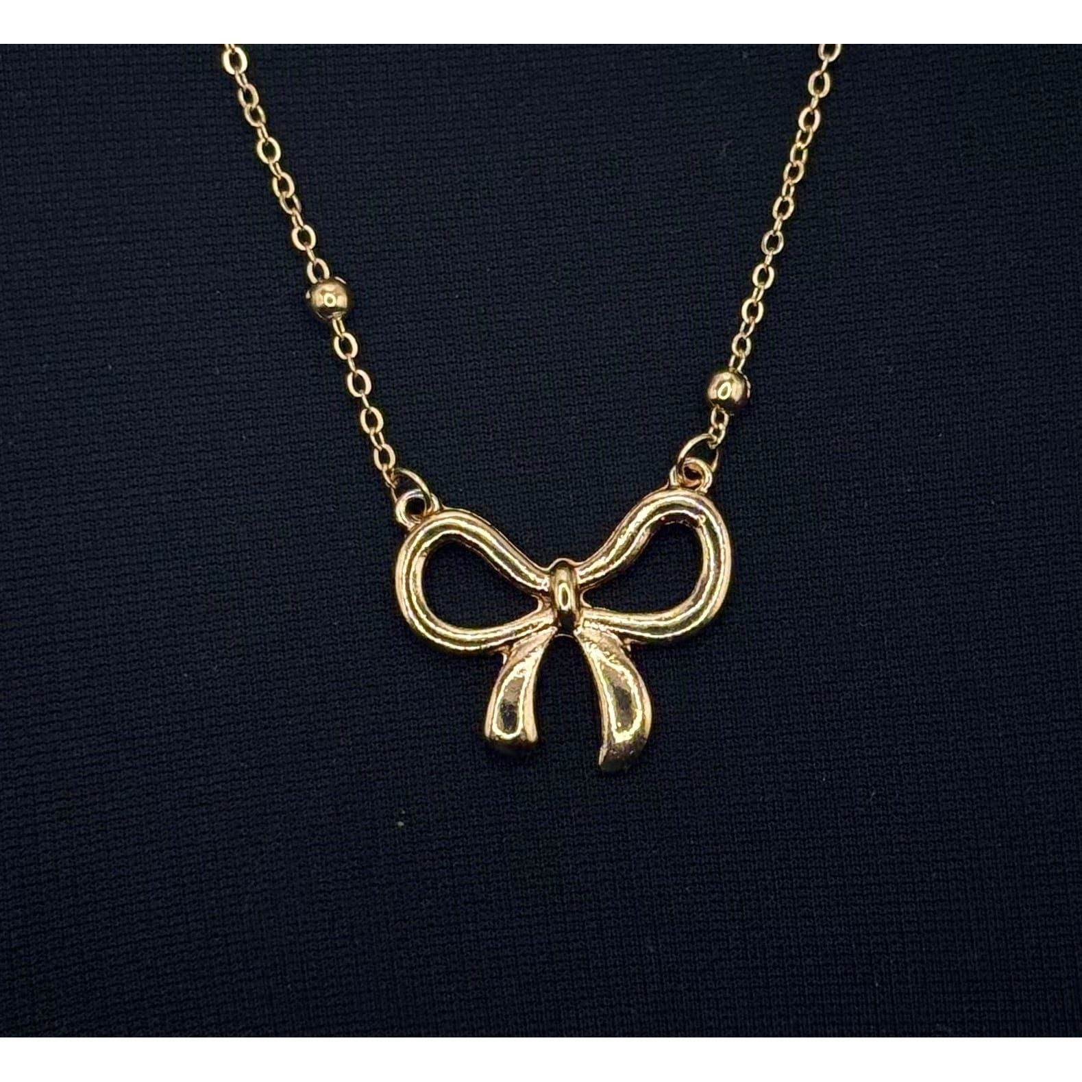 The Smiley Face Boutique Golden Bow Necklace 🎀